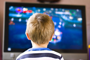 young child watching television
